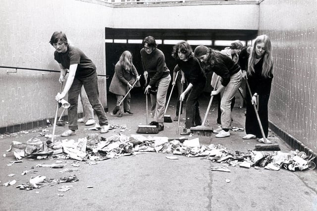 Teenagers clean up Castle Square, in Sheffield city centre, during the wouncil workers strike in October 1970
