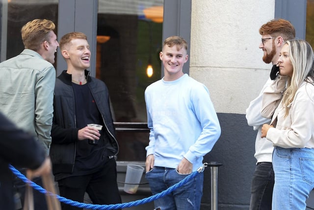 Drinkers outside a Sheffield city centre bar on night out in October, 2020