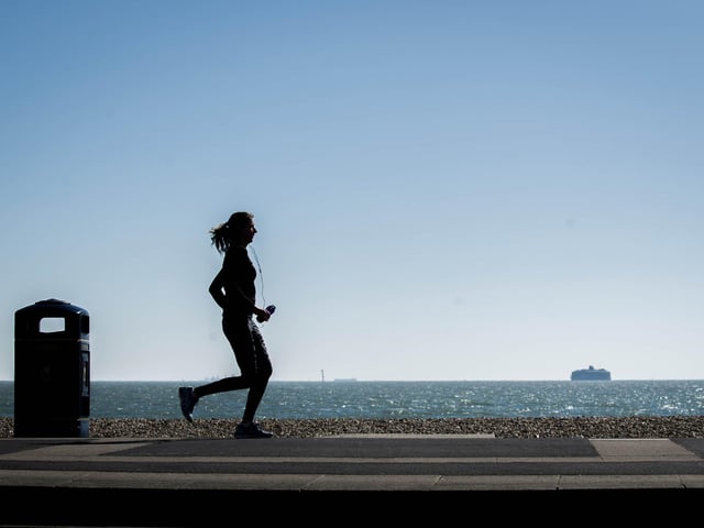 A runner taking advantage of the daily exercise allowance allowed during the lockdown