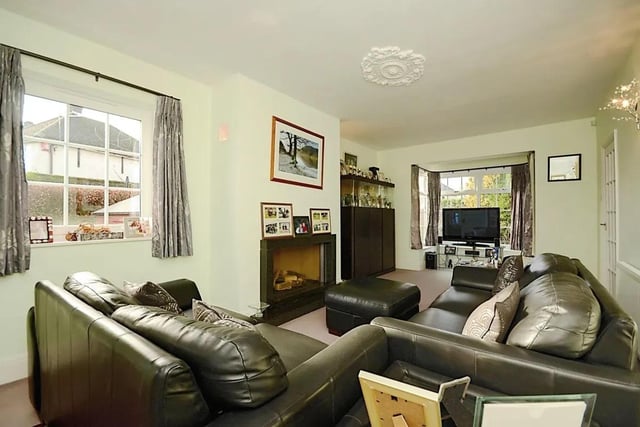 This property benefits from three reception rooms, including this sitting room.