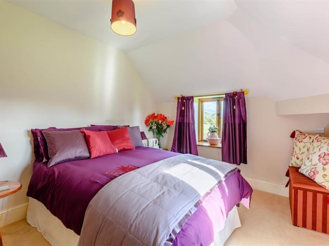 Bedroom number five is extremely comfortable, enjoying a dine dual aspect.