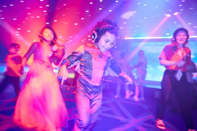 Make-A-Wish UK joined with Disney to create a special treat for Caleb Masaba-Kituyi, who had to have treatment for leukaemea. He is pictured at the silent disco at a special event he was invited to. PIcture: James Gillham