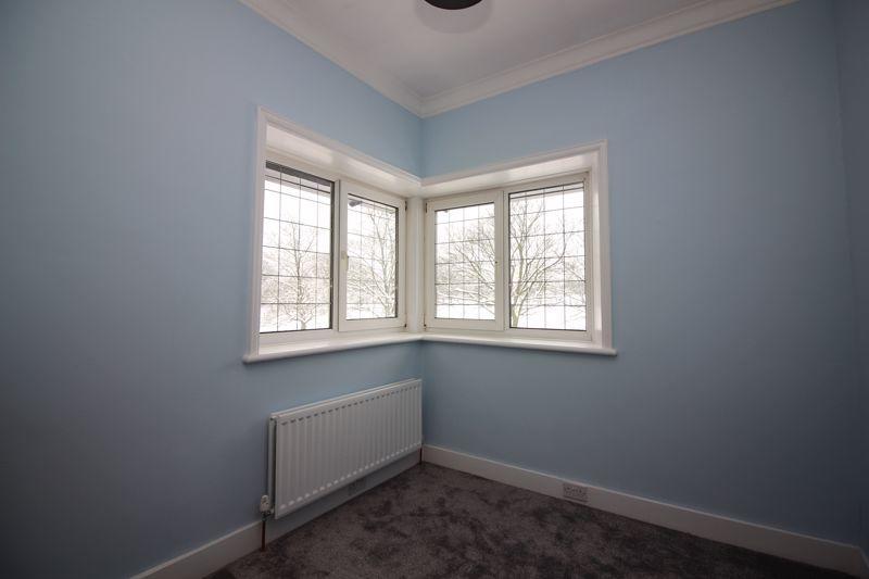 With double-glazed leaded corner window providing this room with a light and spacious aspect and attractive views.