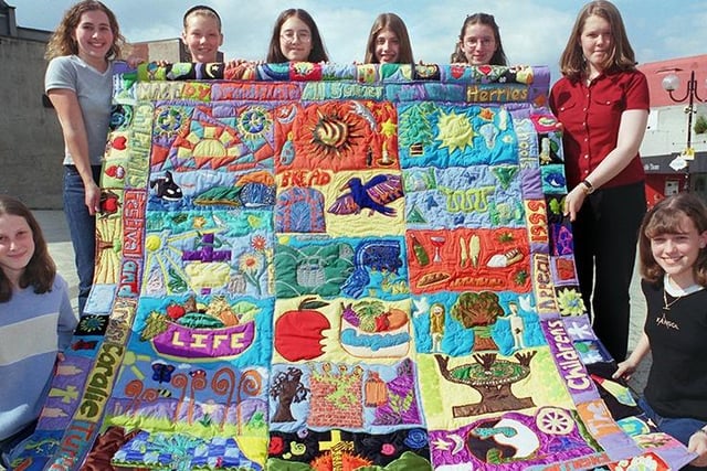 Pupils from All Saints School pictured at the unveiling of an eight-metre wall hanging for the Children's Hospital's new multi-faith centre at the Crucible Theatre where it was to be displayed, June 1999