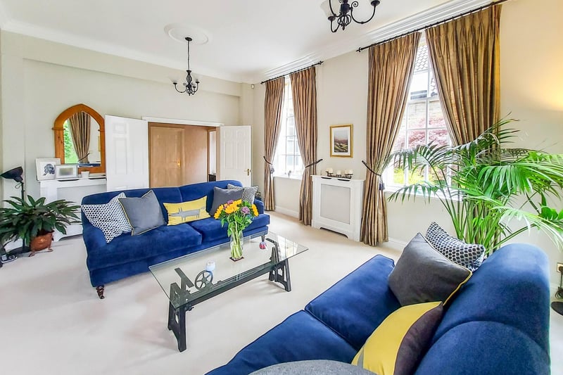 The brochure describes the property as stunning. It says there is an elegant reception room, two bathrooms, garage and parking space in a stunning setting
with patio and communal gardens.