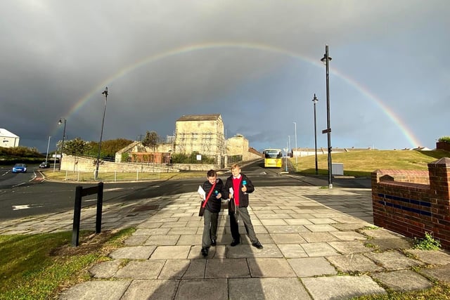 Stopping on the school run to picture the rainbow on October 1, 2021. Rhys and Harry on the Headland.