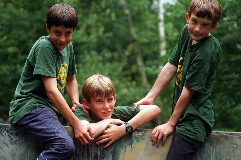 Martin Barrowcliffe and Steven Allen help Gordon Stewart  of the 2nd Ranskill Scouts   over the Hesley Wood  Assault course in 1997