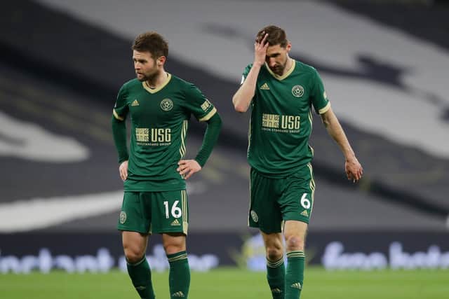 London, England, 2nd May 2021.Dejected Oliver Norwood and Chris Basham (R) of Sheffield Utd during the Premier League match at the Tottenham Hotspur Stadium, London. Picture credit should read: David Klein / Sportimage