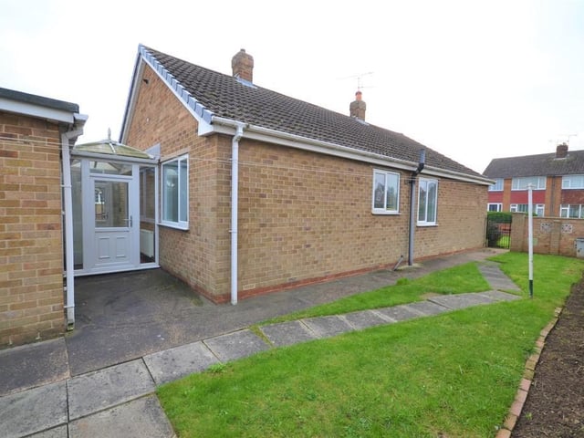The gardens are mainly laid to lawn with pathways leading around the property to a private rear garden with patio seating area "perfect for entertaining"