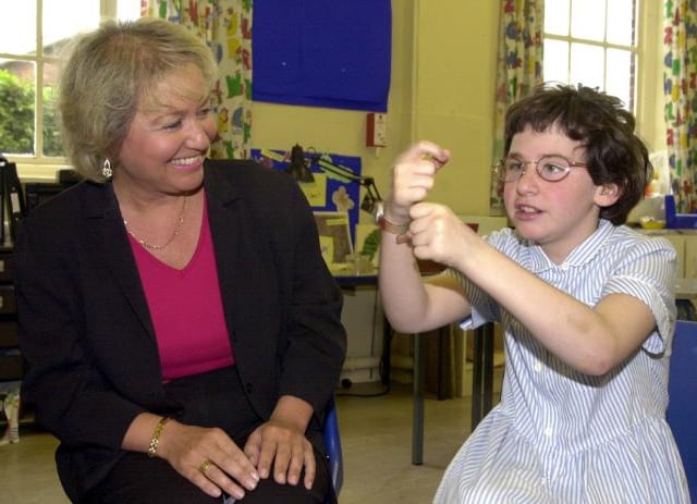 Rosie Winterton spent the day as a volunteer at the Deaf Trust in 2000. She is with child Jade Moffat aged 10.