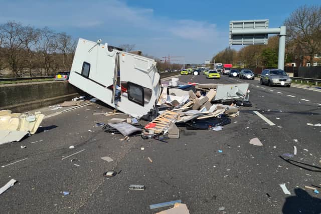 The aftermath of a crash on the M1 near Meadowhall involving an HGV and a caravan