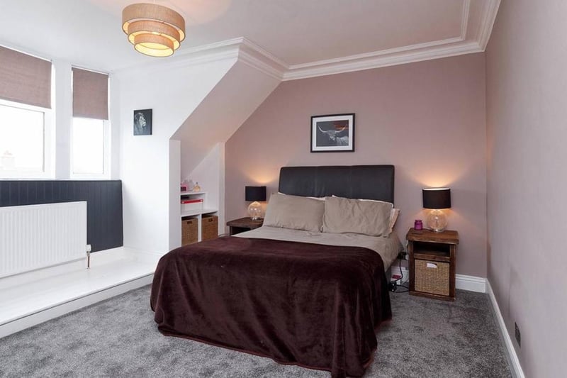 One of the four spacious double bedrooms, perfect for growing families or welcoming guests.