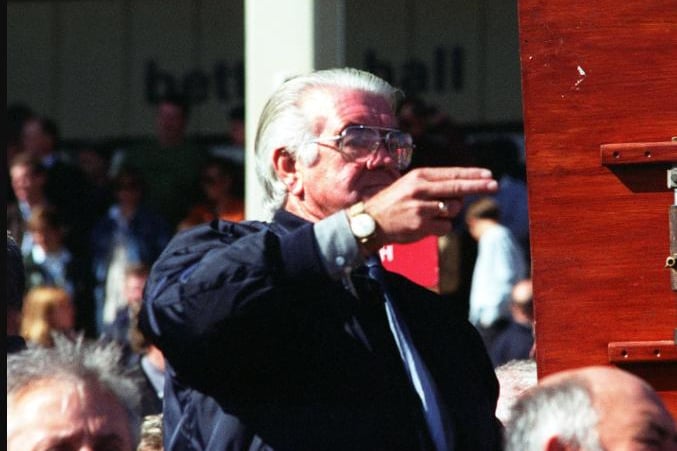 A bookie in action at the 1997 St Leger Day.