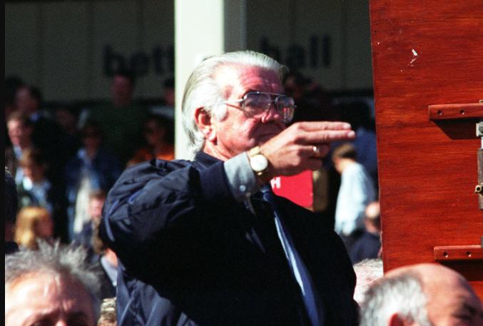 A bookie in action at the 1997 St Leger Day.