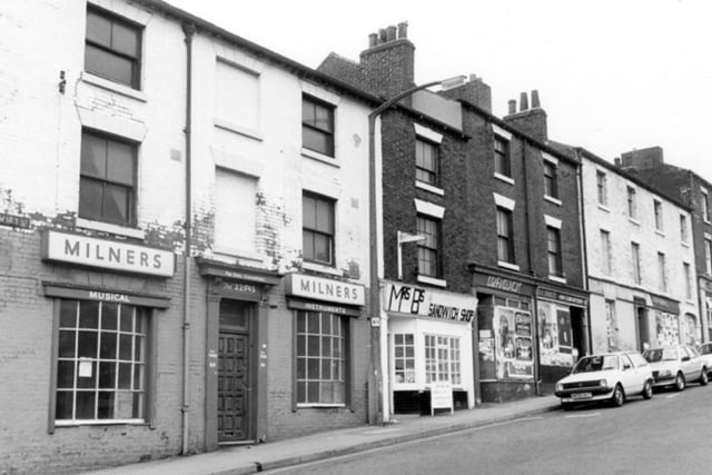 Howard Street, Sheffield, in September 1985, including Milners musical instruments, owned by John Copestake, and Mrs. B's Sandwich Shop. The Globe Inn is visible towards the top of the street, on the far right of the photo.