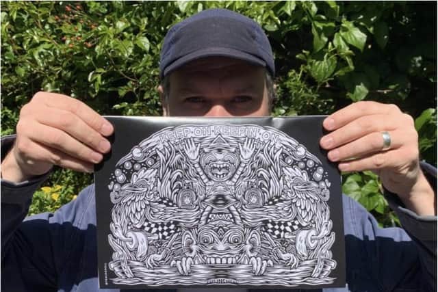 Tom with his illustration.