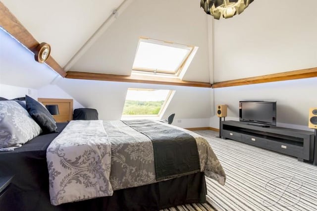 The master bedroom on the first floor has a en-suite and a landing which is currently used as an office.