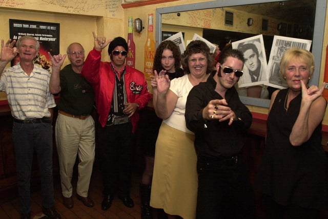 elviskl, Pictured at  Under the Boardwalk, Snigg Hill, Sheffield, in 2002 where an Elvis Tribute night was held.  Seen are fans and lookalikes at the club > LtoR are,  Steve Cutforth, Brian Froggatt, John Burrows, Becky Selwood, Brenda Cutforth, Ed Kelly, and Carole Froggatt.