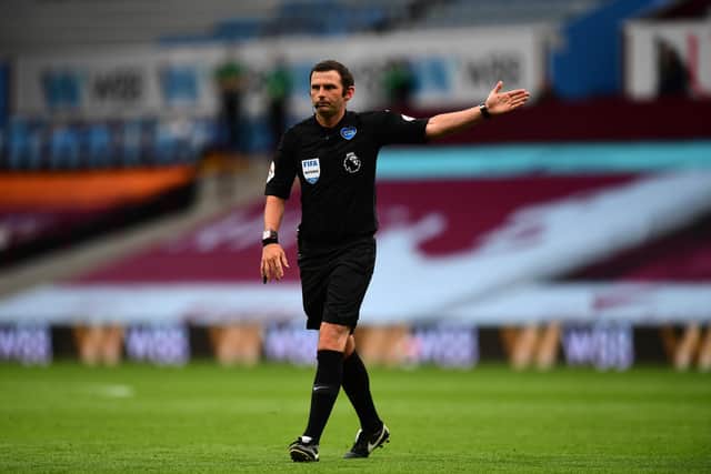 Referee Michael Oliver signals during the Premier League match between Aston Villa and Sheffield United at Villa Park (Photo by Shaun Botterill/Getty Images)