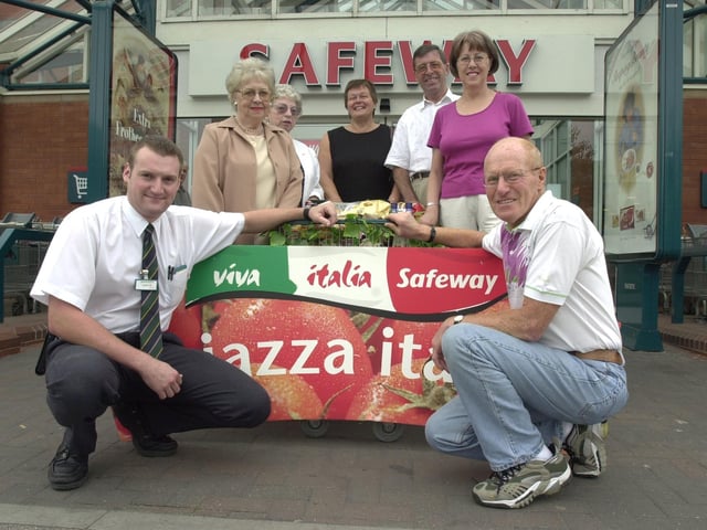 Italian week competiton winners at Safeway, Ecclesall Road. Main prizewinner Ron Jepson right front with store Manager Dave Riby left front and other winners L to R rear Doreen Andrew, Barbara Kirk, Val Hicklin and Tony and Yvonne Lazenby, July 6 2001.