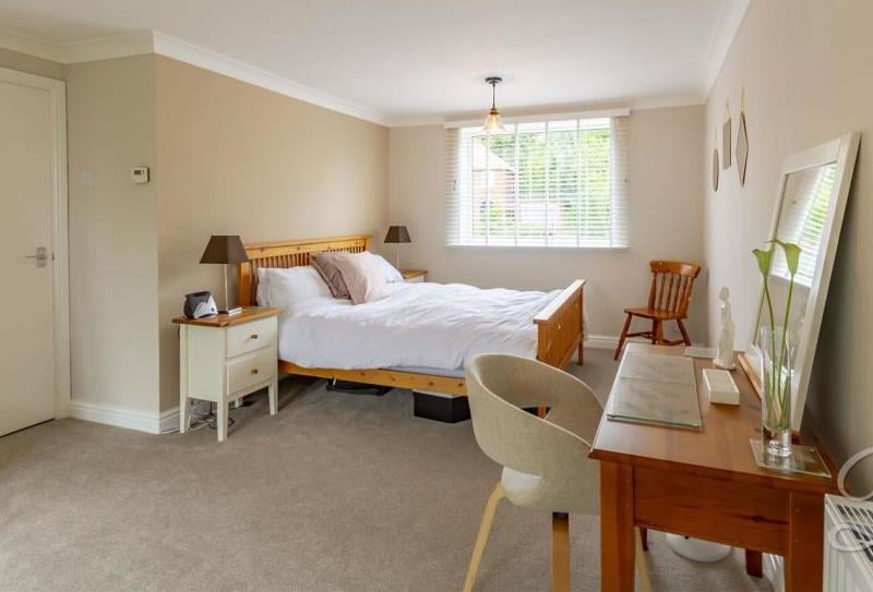 Another simple but elegant bedroom at the Lichfield Lane property. Complete with carpeted floor, central-heating radiator and window.