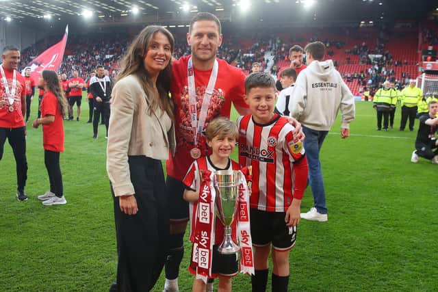 Billy Sharp celebrates Sheffield United's promotion with his family: Simon Bellis / Sportimage