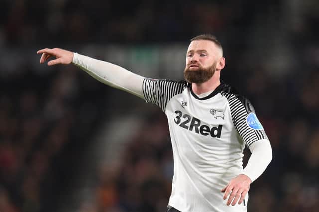 Derby County's English striker Wayne Rooney reacts during the English FA Cup fifth round football match between Derby County and Manchester United at Pride Park Stadium in Derby, central England on March 5, 2020: OLI SCARFF/AFP via Getty Images
