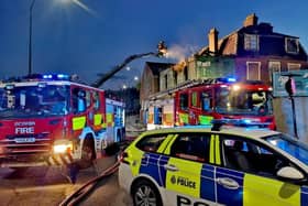 A cordon today remained in place on Spital Hill, Sheffield, around a building which was left seriously damaged by a major fire on Sunday night. PIcture shows firefighters on the scene on Sunday.