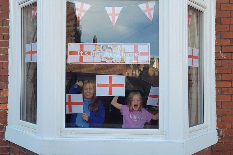 Honour and Monica show their support (and show off their window display).