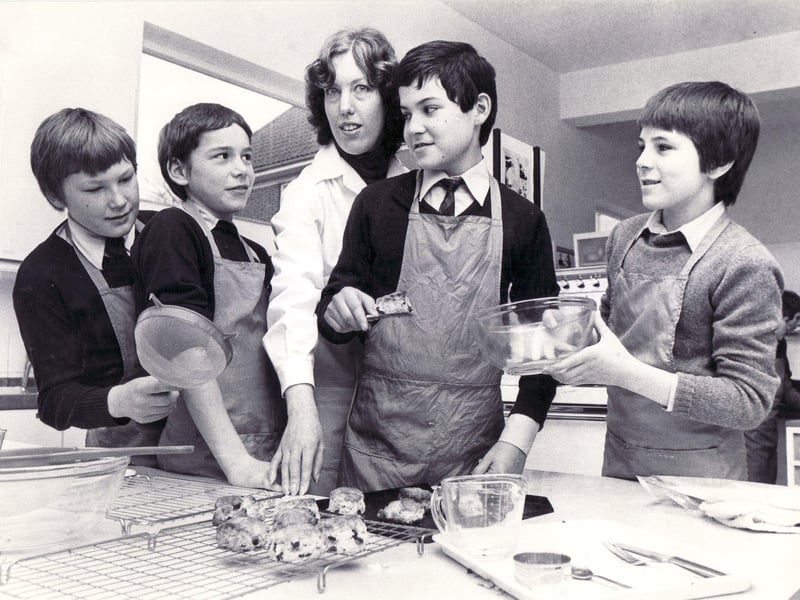 Mrs Pamela Evans, head of home economics, with pupils, from left, Graham Learmonth, Jason Hogan, Nigel Brindley and Steven Oldfield celebrate the High Storrs School centenary in March 1980