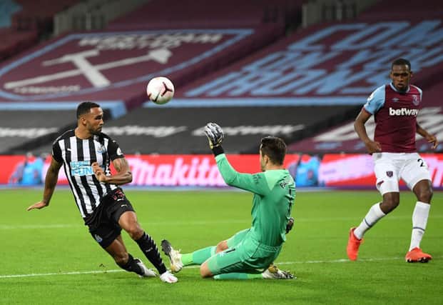 Lukasz Fabianski of West Ham United saves from Callum Wilson of Newcastle United during the Premier League match between West Ham United and Newcastle United at London Stadium on September 12, 2020 in London, England.