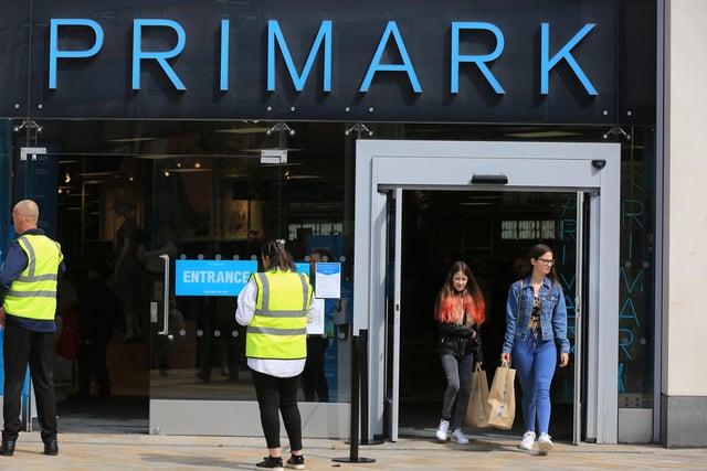 Primark staff monitoring the queue outside the store on The Moor today.