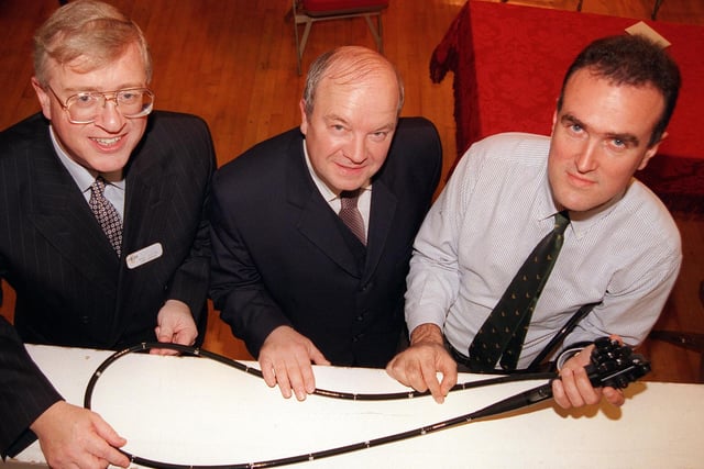Alan Dootson, centre, St John's Hospice Appeal and Doncaster Cancer Detection Trust treasurer, handed over the visual imaging camera to consultant surgeon John Bagley, right, watched by Nigel Clifton, chief executive of The Doncaster Royal and Montagu Hospital. The presentation took place at the Mansion House  in 1999