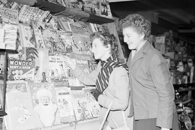 Two women shop for books at Thorntons in 1958.