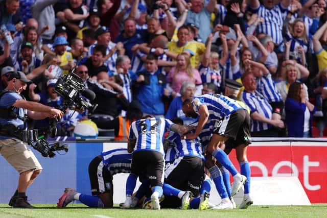 LONDON, ENGLAND - MAY 29: Josh Windass (obscured) of Sheffield Wednesday celebrates with teammates after scoring the team's first goal during the Sky Bet League One Play-Off Final between Barnsley and Sheffield Wednesday at Wembley Stadium on May 29, 2023 in London, England. (Photo by Richard Heathcote/Getty Images)