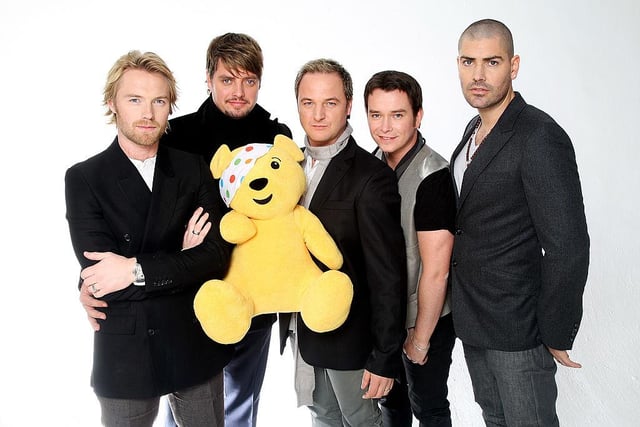 Boyzone are pictured with Pudsey in 2007, marking the band’s reunion and their performance on BBC Children in Need’s Appeal Night (Photo: Getty Images)