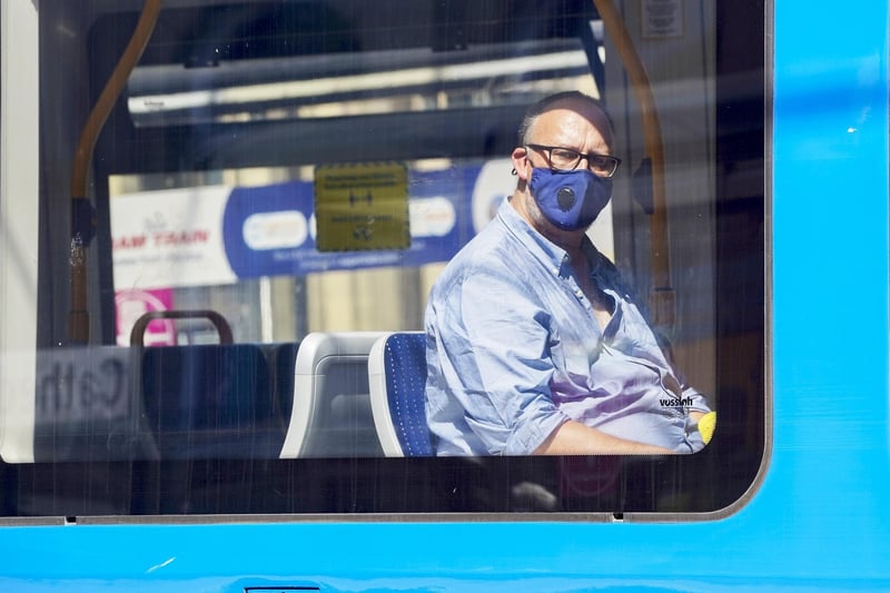 Another 'Freedom Day' tram passenger who opted to keep his mask on