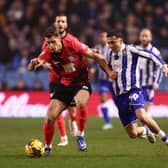 SHEFFIELD, ENGLAND - FEBRUARY 09: Krystian Bielik of Birmingham City battles for possession with Ian Poveda of Sheffield Wednesday during the Sky Bet Championship match between Sheffield Wednesday and Birmingham City at Hillsborough on February 09, 2024 in Sheffield, England. (Photo by Naomi Baker/Getty Images)