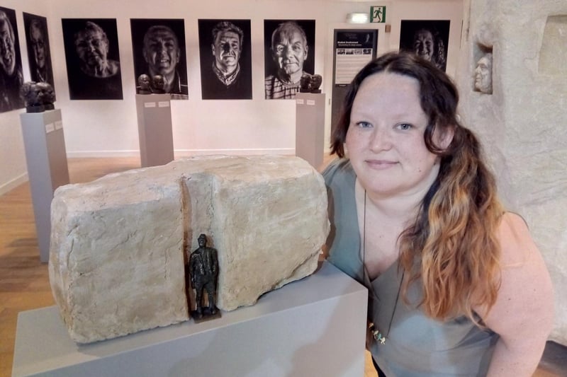 Jo McQuade, miners daughter and local government officer, with a model of the memorial when it was on exhibition at the Frenchgate Centre, before it was built