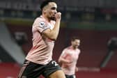 Kean Bryan of Sheffield Utd celebrates scoring his sides opening goal during the Premier League match at Old Trafford, Manchester. Picture date: 27th January 2021. Picture credit should read: Andrew Yates/Sportimage
