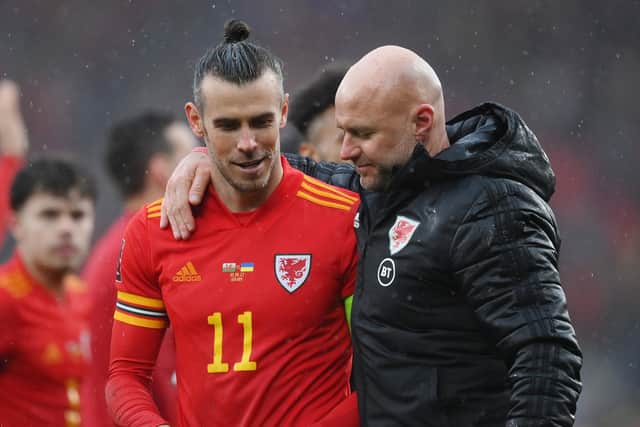Former Sheffield United defender and current Wales boss Rob Page enjoys Wales' qualification for the 2022 World Cup with star midfielder Gareth Bale - Shaun Botterill/Getty