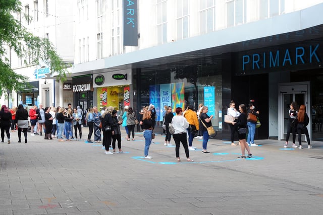Queuing for Primark in Commercial Road, Portsmouth. Picture: Sarah Standing (150620-9756)