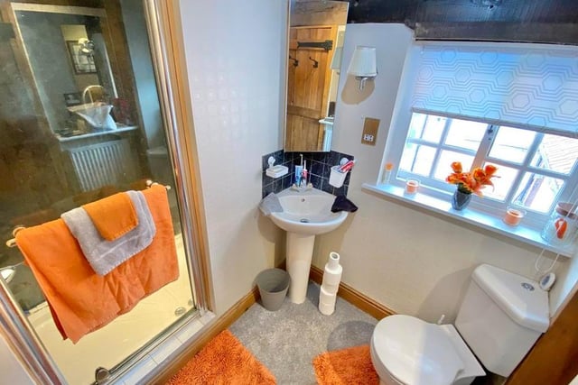 Cute is the best way to describe this shower room. It includes a walk-in shower, wash hand basin and low-flush WC, not forgetting a beamed ceiling.