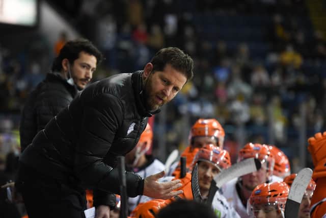 Sheffield Steelers coach Aaron Fox makes a point to his team