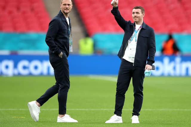 Scotland's Liam Cooper (left) and John Fleck walk the pitch prior to the UEFA Euro 2020 Group D match at Wembley Stadium, London. Picture date: Friday June 18, 2021. PA Photo. See PA story SOCCER England. Photo credit should read: Nick Potts/PA Wire.