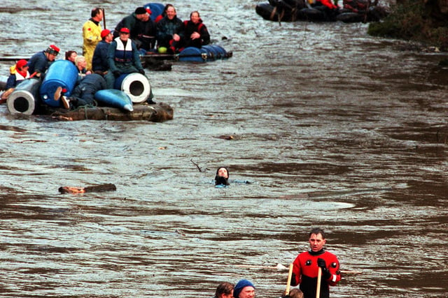 Hardy competitors nearing the end the annual Boxing day charity raft race some without rafts back in 1997