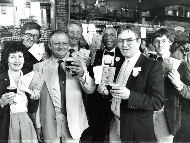 Roger Howill, licensee of the Frog & Parrot, Division Street, celebrating the launch of his new "Roger & Out" special beer in June 1985