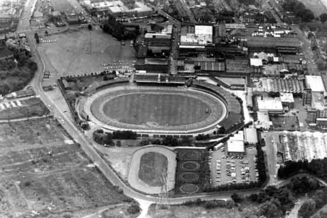 An aerial view of the Sheffield Sports Stadium (latterly Owlerton Stadium and Owlerton Greyhound Stadium) on Penistone Road, Sheffield, in 1981, with the Bassetts sweet factory on the right.