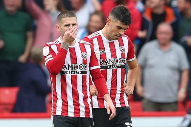 Dejected Oliver Norwood of Sheffield Utd and John Egan of Sheffield Utd after the defeat to Huddersfield Town. Simon Bellis / Sportimage