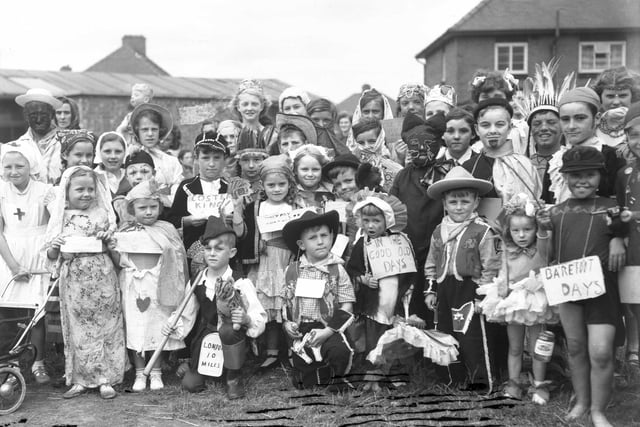 Children dress up in fancy dress in this great picture from the archives but what was the year?